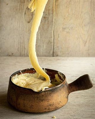  Aligot – Eine cremige Käsespätzle-Sinfonie mit karamellisierten Knoblauchstückchen!